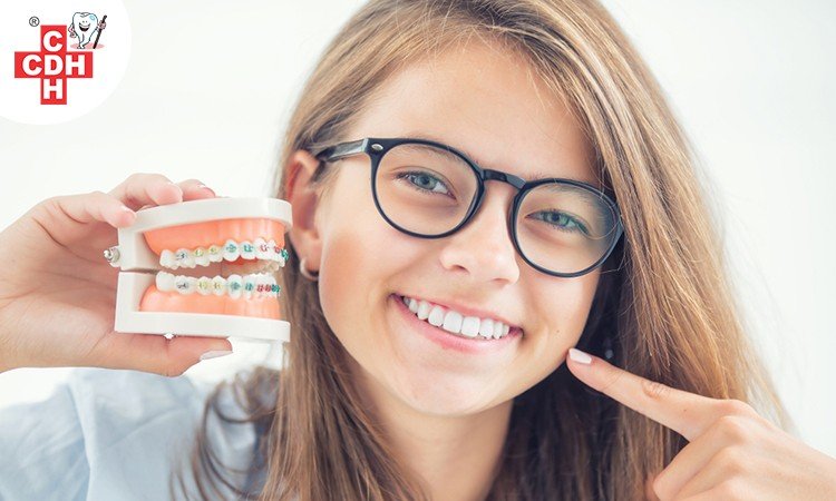 What is the difference between a dentist and an orthodontist