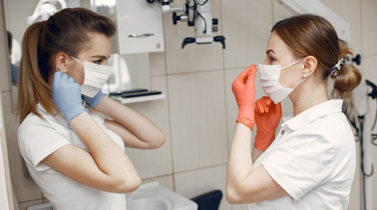 Dental Hygienist Performing Professional Teeth Cleaning