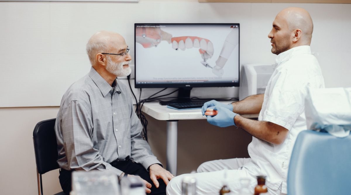 City Dental Hospital expert explaining the differences between dental implant types